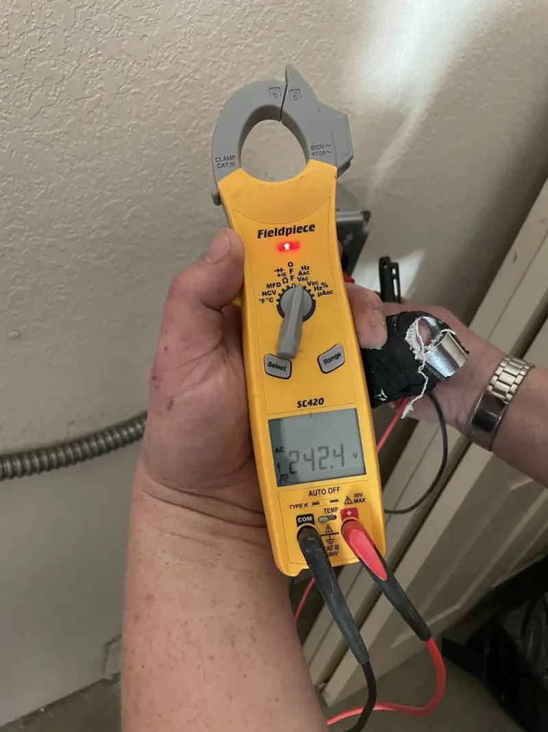 Voltage testing with clamp meter during Hot Tub / Pool Electrical Wiring in Shenandoah